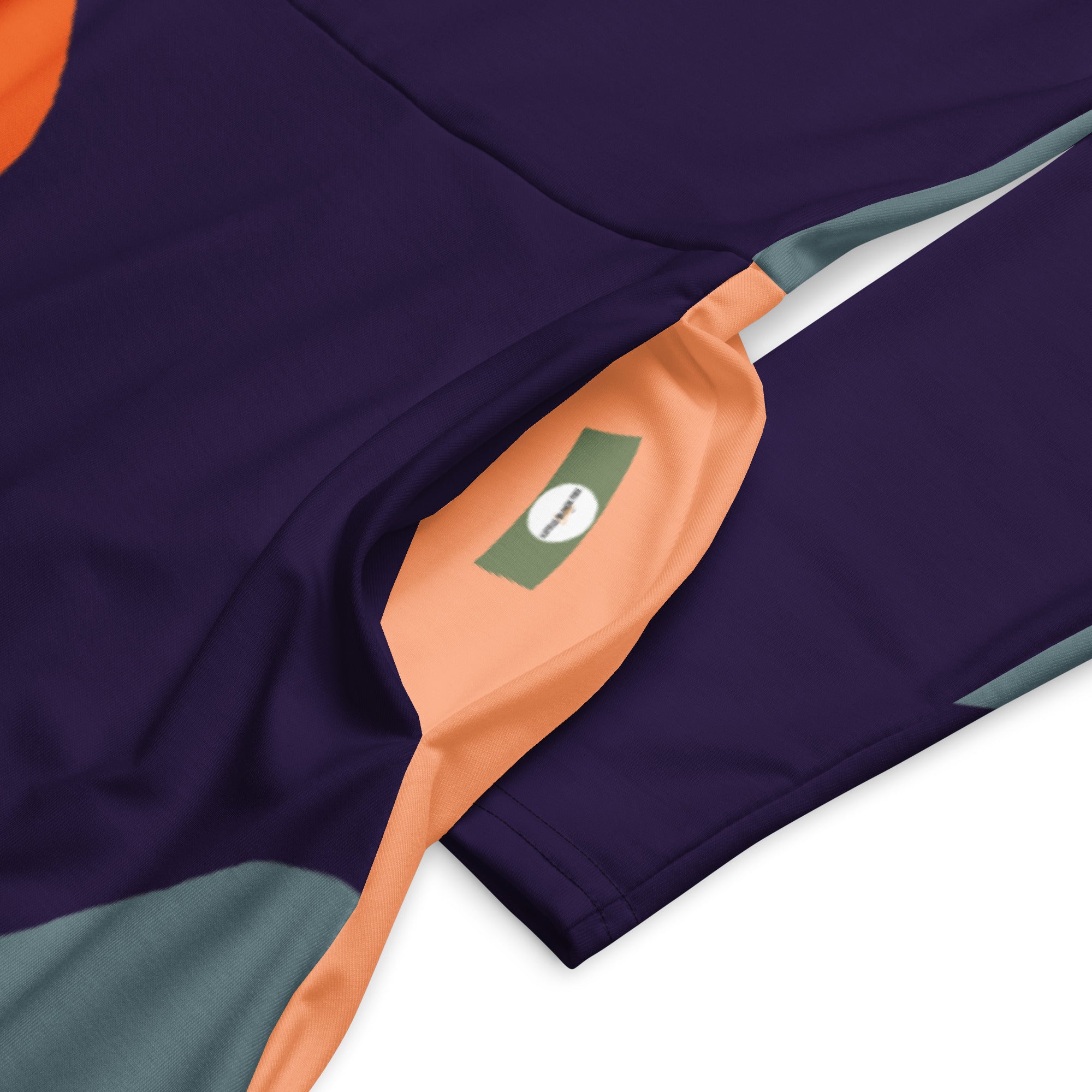 Pocket: Flow Midi Dress in purple colourway — close up pocket and iner label detail